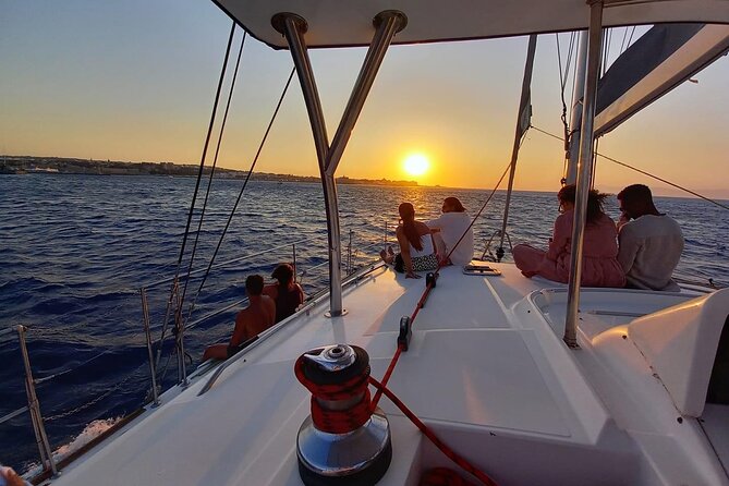 3-Hours Sunset Catamaran Cruise with Dinner all Inclusive - Leaving Mandraki Harbor for Kallithea Bay