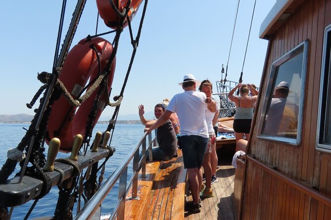 3 Island Cruise Tour in Kos Island with Personalized Audio Guide - Food, drinks, music, and the onboard mood