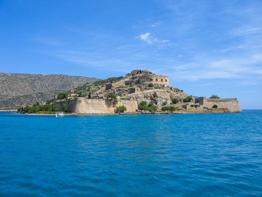 Agios Nikolaos: Boat Trip to Spinalonga with Swim Stop - Landing on Spinalonga: fortress, colony, and hard questions