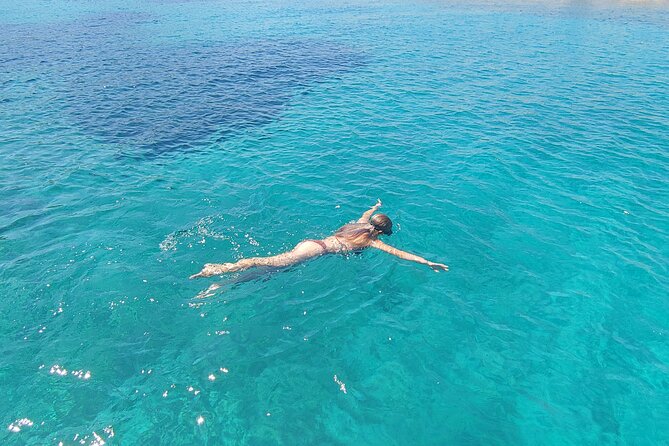 Antiparos & Despotiko Kaiki Cruise — Coves, Swim & BBQ - Despotiko, swimming, and the BBQ