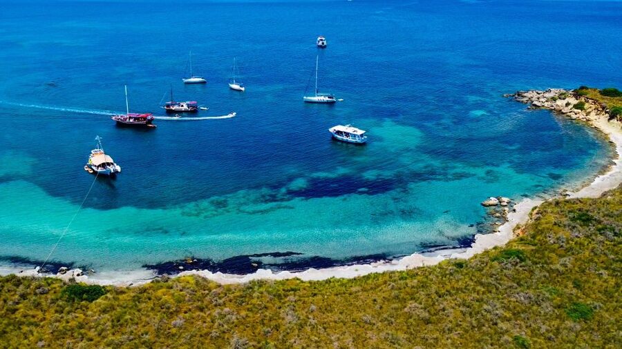Argostoli: Full-Day Boat Cruise with Lunch - What lunch and drinks add to the price