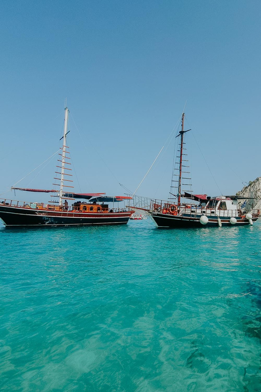 Argostoli: Full-Day Boat Trip with Lunch & Wine - What the crew adds to the experience