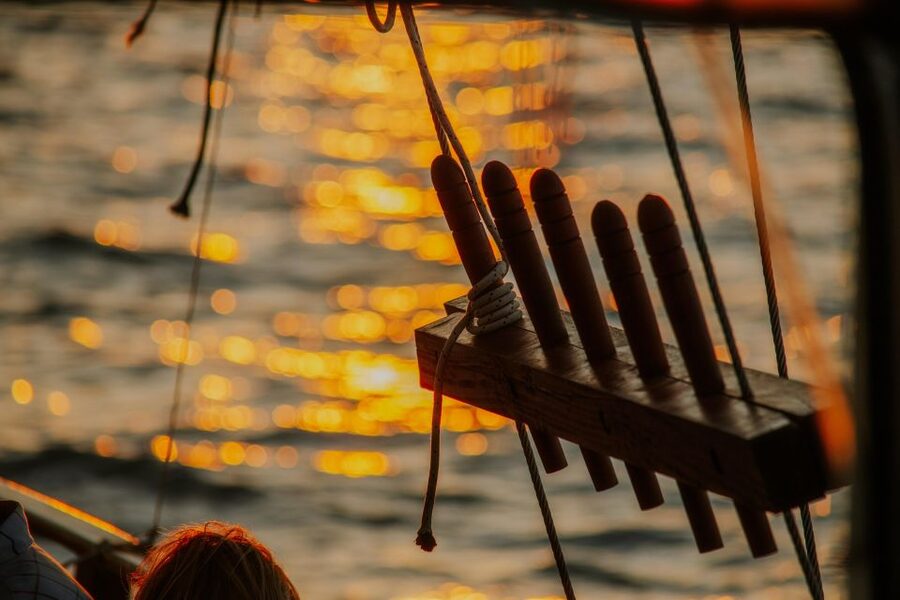 Argostoli: Sunset Cruise with Swim Stops, Dinner, and Wine - Moussaka, Greek salad, and wine on deck