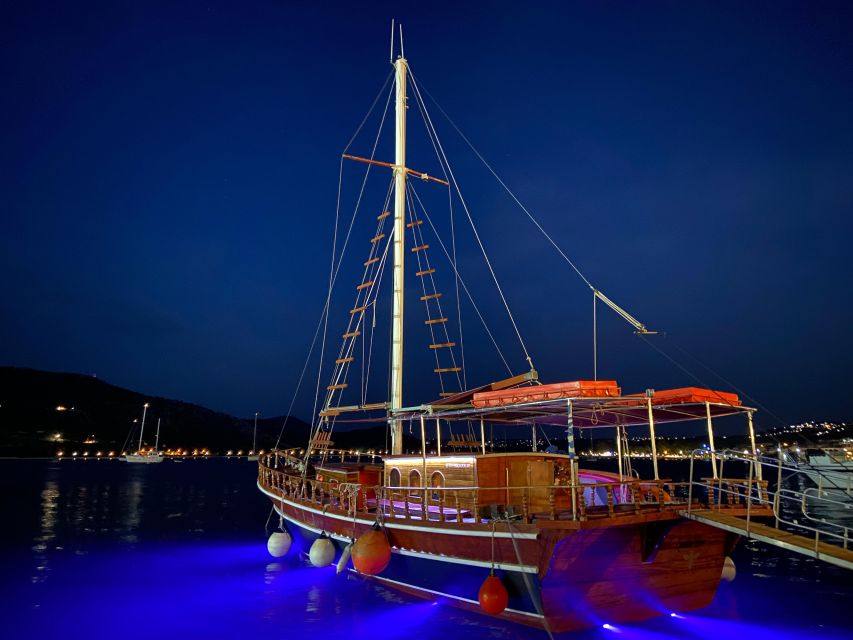 Argostoli: Sunset Cruise with Swim Stops, Dinner, and Wine - Sunset over Kefalonia