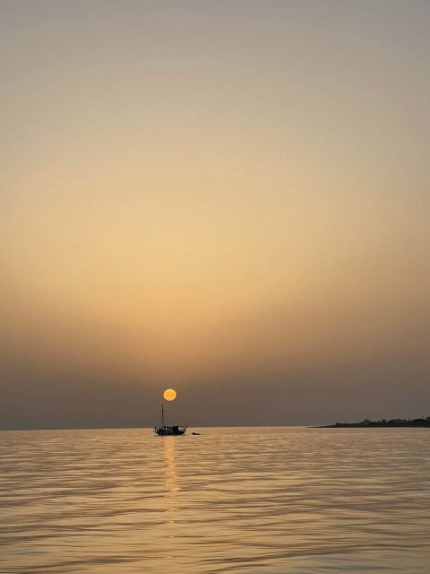 Argostoli: Sunset Cruise with Swim Stops, Dinner, and Wine - Sailing west from Argostoli