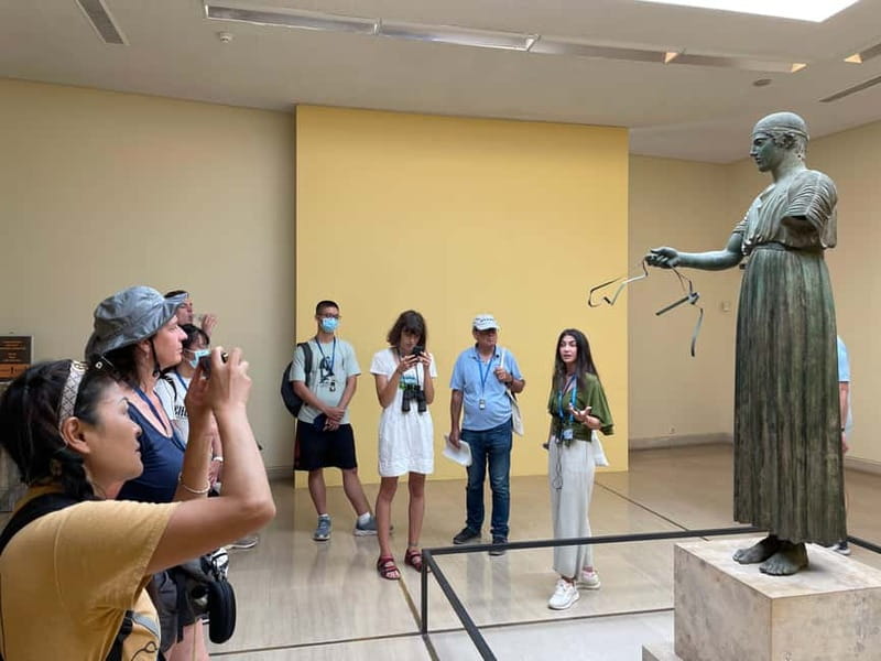 Athens: Delphi Guided Trip with Optional Lunch and Entry - Walking through the Delphi Archaeological Site