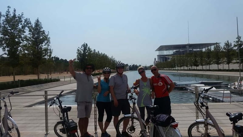 Athens: Electric Bike Seaside Tour with Guide - Stavros Niarchos: a modern stop on a coastal ride