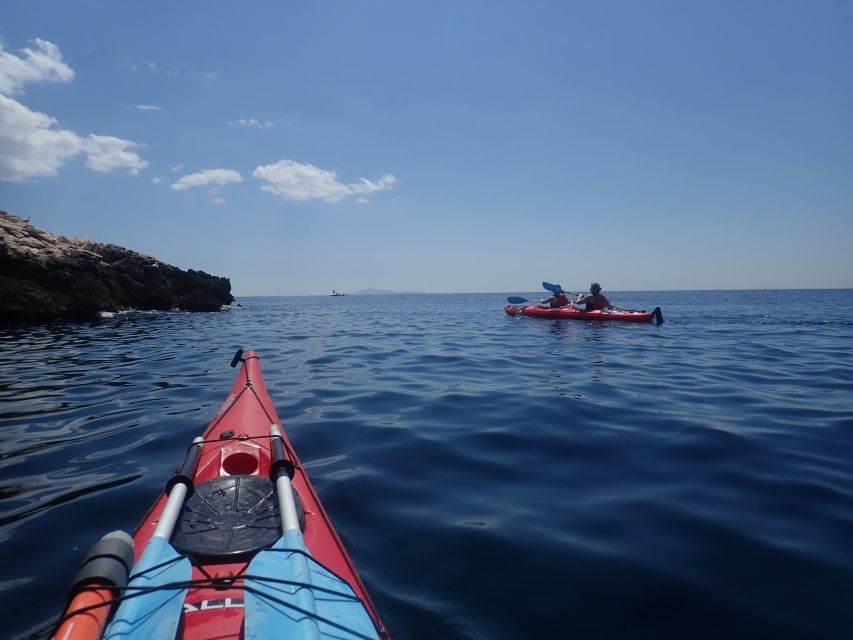 Athens: Sea Kayak Sunset Tour - Paddling the first hour along the coast