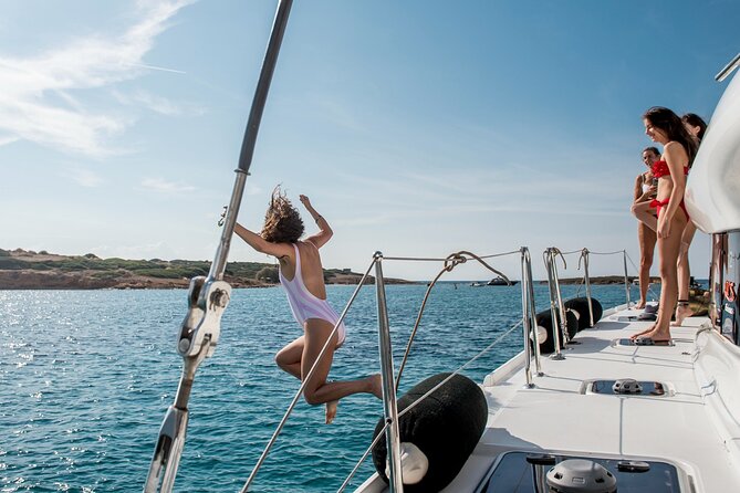 Athens Semi private Morning Catamaran cruise with meal & drinks - Megalo Kavouri: your first swim in clear, shallow water