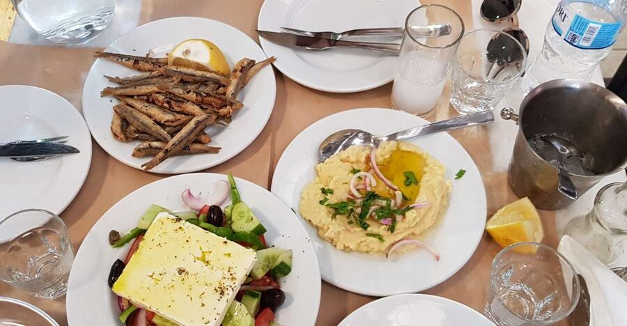 Athens: Traditional Greek food tour in hidden spots - Athens market life in fish, meat, and spice