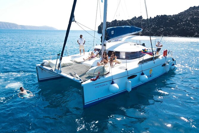Best of Santorini Private Half-Day Catamaran Cruise with transfer and meal - White Beach, a quieter contrast by boat