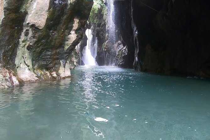 Canyoning in the water - Kourtaliotiko Gorge - Stone steps lead to the river source