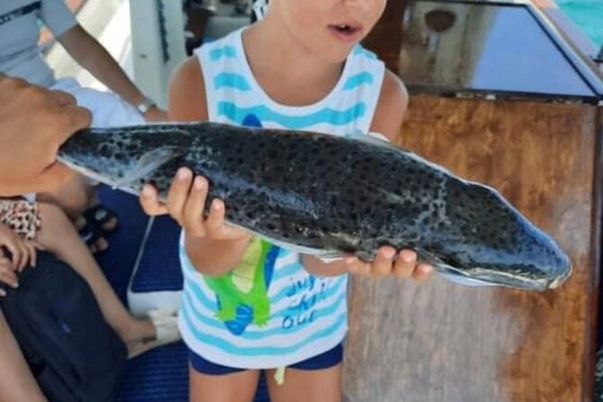 Captain Manolis Fishing with barbecue on the boat - The opening run: trolling for little tuna