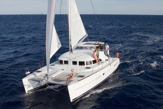 Catamaran Day & Sunset Cruises with meals Drinks and transportation - Leaving Tourlos With Mykonos in View