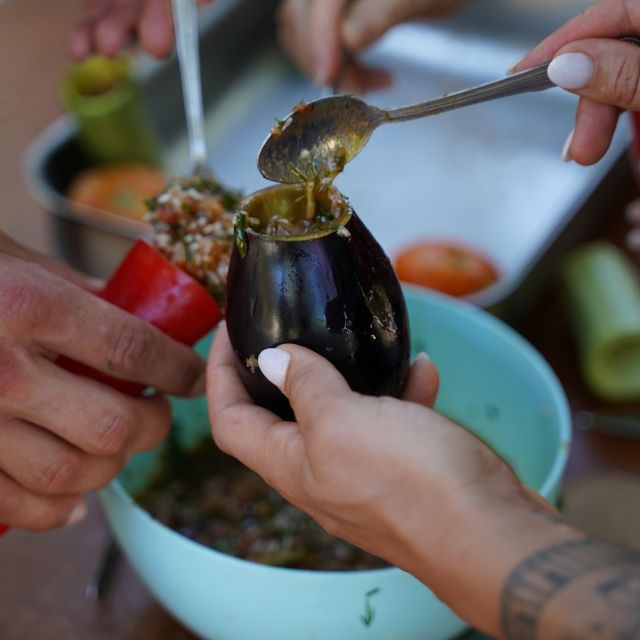 Chania: Authentic Cooking Class - Sitting down to a full Cretan meal