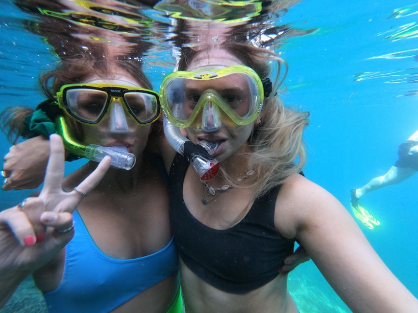 Chania: Boat Trip with Guided Snorkeling & Stand-Up Paddling - Languages, group size, and timing