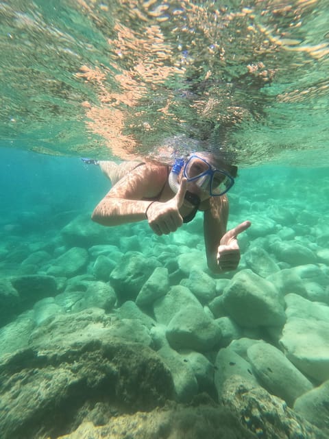 Chania: Boat Trip with Guided Snorkeling Tour - The fruit break between the two sessions