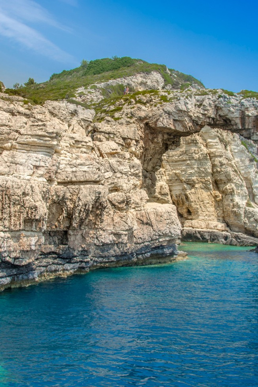 Corfu: Paxos Island Full-Day Cruise with Blue Caves - Boat comfort, crowd levels, and onboard atmosphere