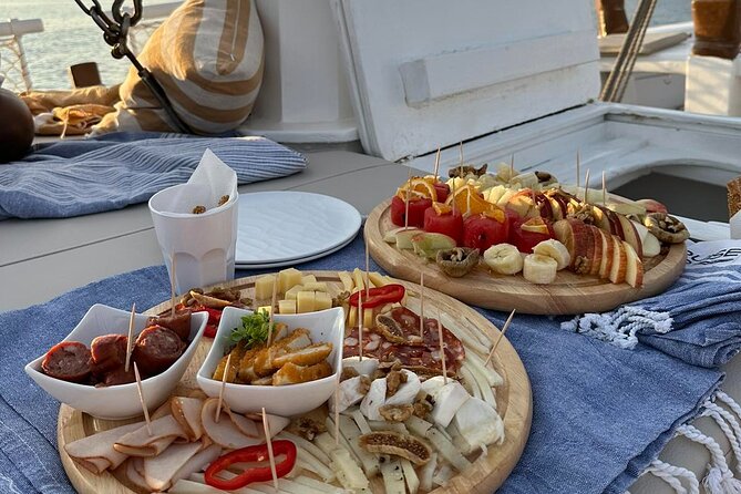 Corfu: Sunset Cruise on a Wooden Vessel with Cocktails & Bites - Garitsa Bay and the Corfu Town shoreline