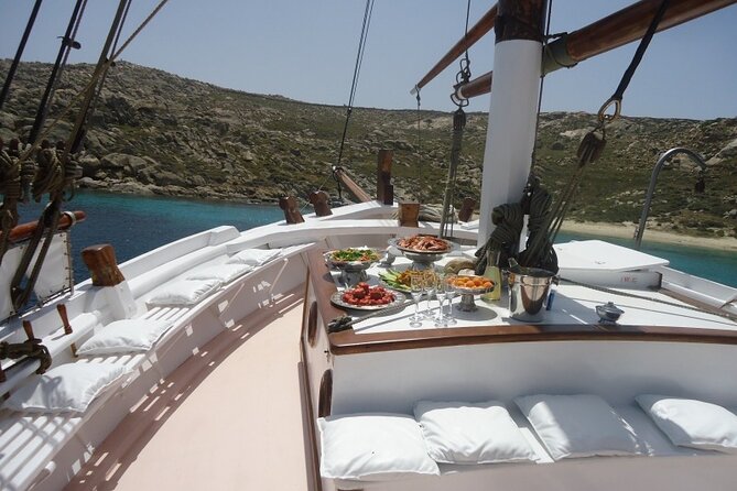 Corfu: Sunset Cruise on a Wooden Vessel with Cocktails & Bites - Mouse Island and the Kanoni sunset