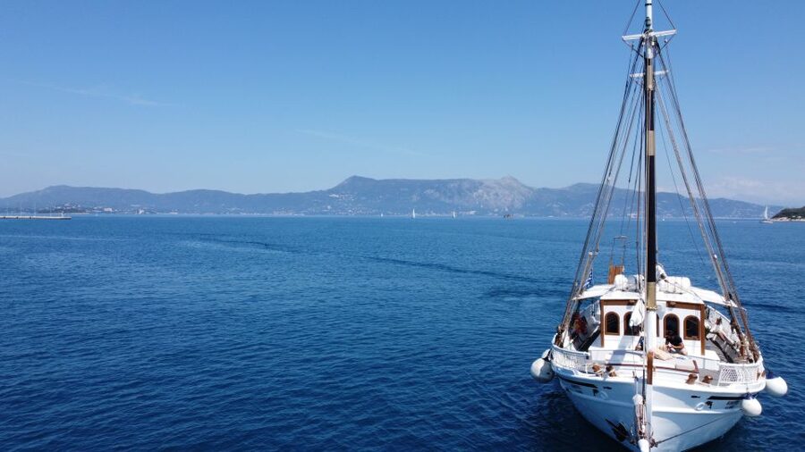 Corfu: Sunset Cruise on Classic Boat with Cocktails & Snacks - Reaching Pontikonissi at Sunset