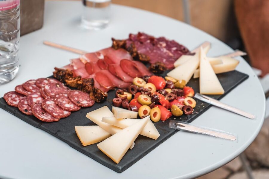 Corfu Town: Guided Walking Tour and Local Food Tastings - The first food stop is more than a snack