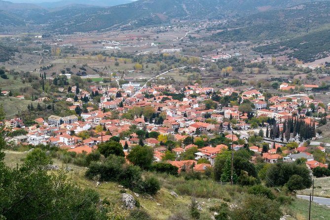 Corinth, Cave of Lakes, Odontotos Railway Private Tour with Greek Lunch Included - Kalavrita lunch: the human highlight of the day