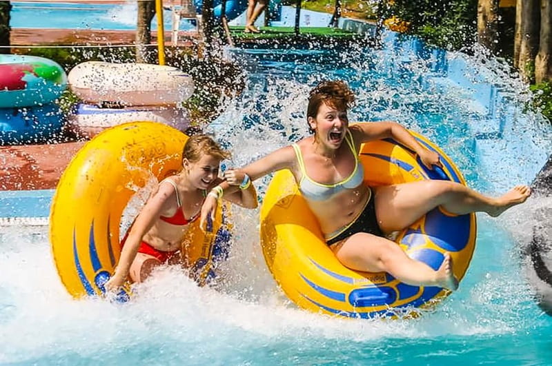 Crete: Acqua Plus Water Park Entrance Ticket with Transfer - The main pool, lazy river, and hydromassage break