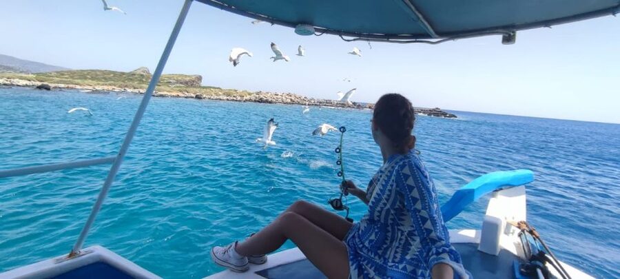 Crete: Fishing & Swimming Boat Cruise with Lunch & Drinks - Passing Spinalonga and the sights around the bay
