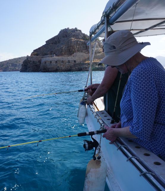 Crete: Fishing & Swimming Boat Cruise with Lunch & Drinks - Learning simple fishing techniques near Elounda