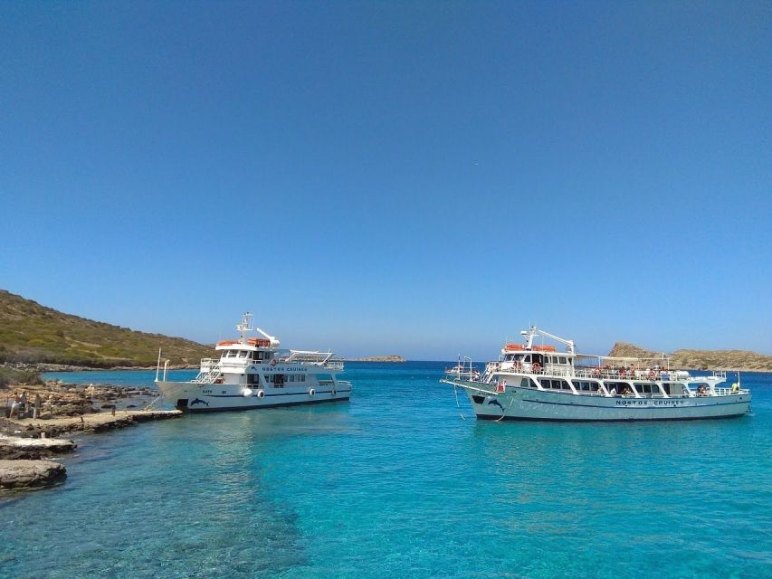 Crete: Mirabello Bay Cruise with Onboard Cocktail - The boat, seating, and search for shade