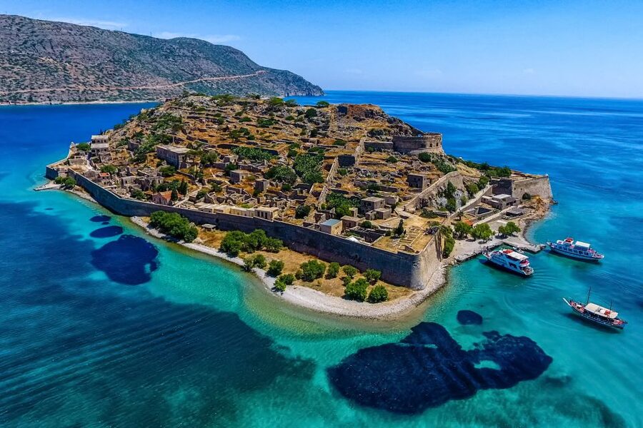 Crete: Spinalonga, Elounda, & Agios Nikolaos Boat Tour & BBQ - Elounda and the first boat ride