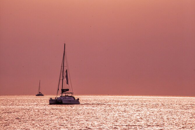 Deluxe Santorini Sailing with BBQ and Drinks Shared Tour - Red Beach and White Beach from the sea