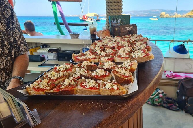 Dreamy Sails Daily Cruises at Argostoli Kefalonia Island - Final swimming stop: White Rocks Beach and its pool bar