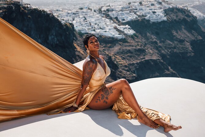 Exclusive Santorini Flying Dress Photoshoot with Pickup - Imerovigli Blue Domes and Caldera Views