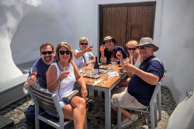 Experience Santorini: Wine Tasting Small Group Tour - Artemis Karamolegos Winery and the final food spread