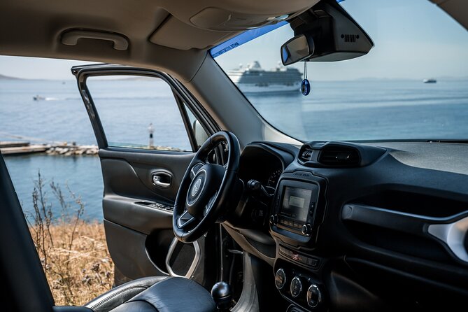 Explore Mykonos with local guide and Jeep Renegade Private Tour - Ftelia shows a windsurfer’s side of Mykonos
