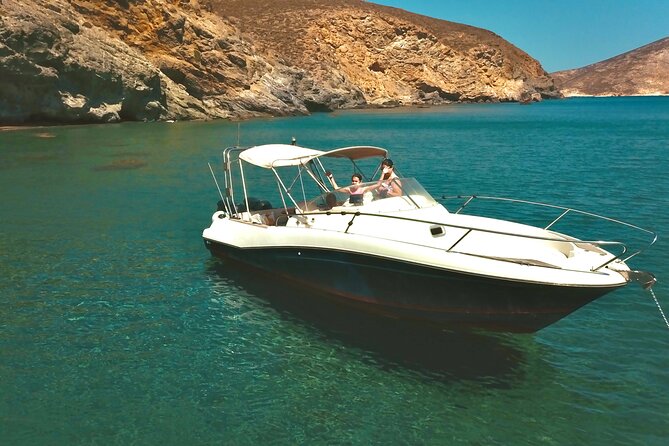Explore Santorini and its volcanic wonders with Alex Private Boat - Greek Food, Meze, Wine, and Music on Board