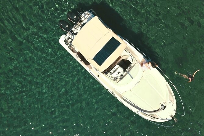 Explore Santorini and its volcanic wonders with Alex Private Boat - Meeting the Boat at Santorini Old Harbor