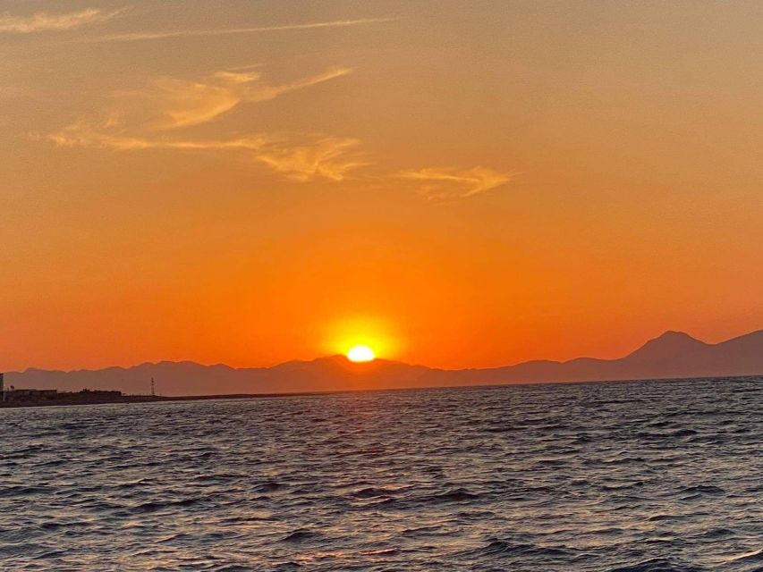 Faliraki: Evening RIB Cruise with Champagne and Sunset Views - The east-to-west crossing and open-sea views
