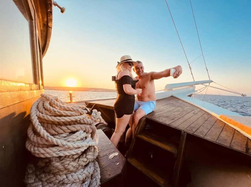 Faliraki: Sunset Cruise with Unlimited Aperol, Beers & Wine - Drinks, music, and the onboard mood