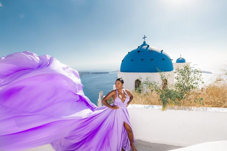 Flying dress Photoshoot in Santorini with Hotel Pickup - Imerovigli, blue domes, and the Caldera