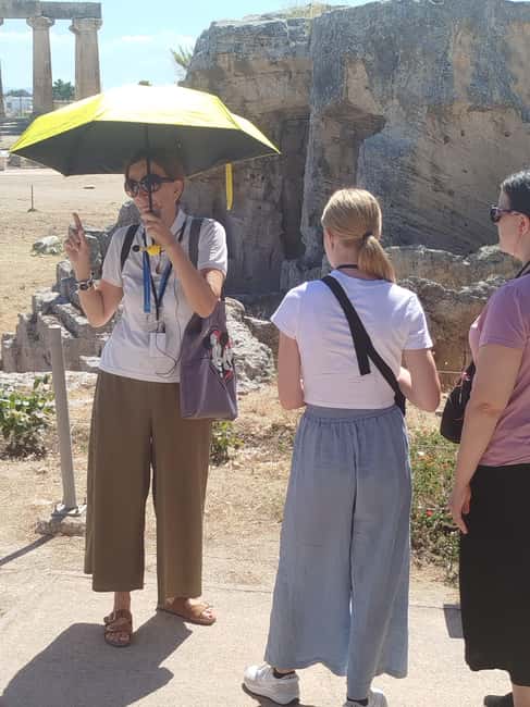 From Athens: Ancient Corinth Tour Official Guide & Tickets - Walking through the Agora and Temple of Apollo