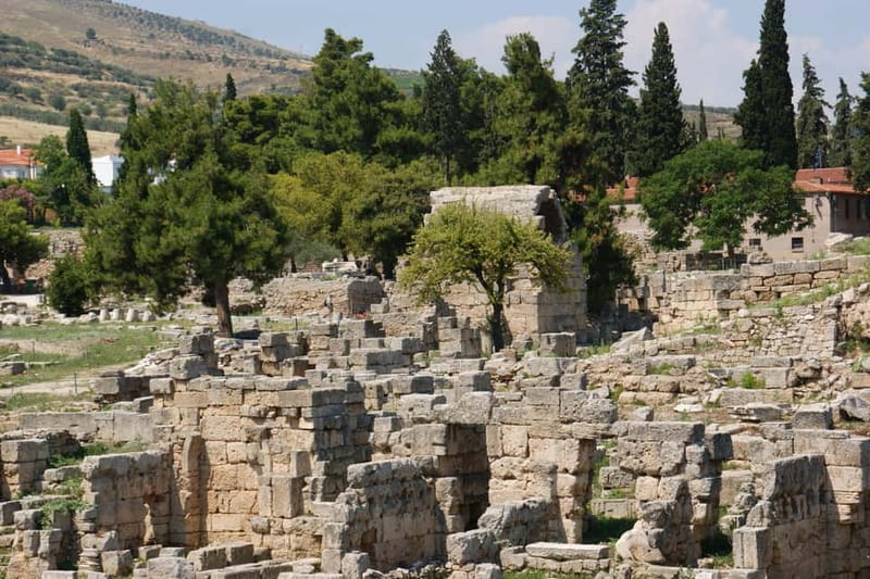 From Athens: Ancient Corinth Tour Official Guide & Tickets - The Corinth Canal stop is brief but worthwhile