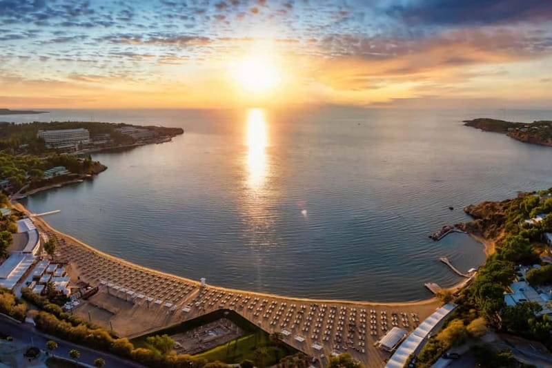 From Athens: Lake Vouliagmeni Spa & Temple of Poseidon Tour - Standing beneath the Temple of Poseidon