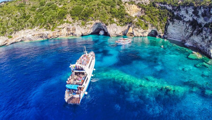 From Corfu: Day Cruise to Paxos, Antipaxos, and Blue Caves - Antipaxos swimming at Mesovrika or Voutoumi