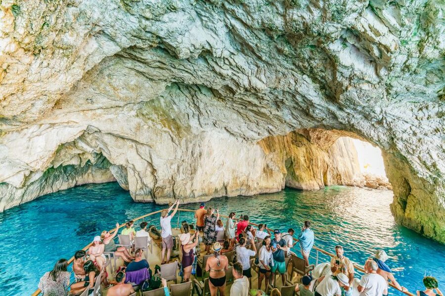 From Corfu Island: Antipaxos & Paxos Blue Caves Boat Cruise - Transfers, meeting points, and the early start