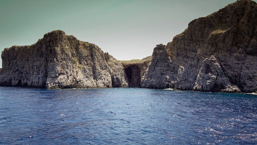 From Heraklion: Elounda, Kolokitha, and Spinalonga Boat Trip - Kolokitha Beach closes the scenic route