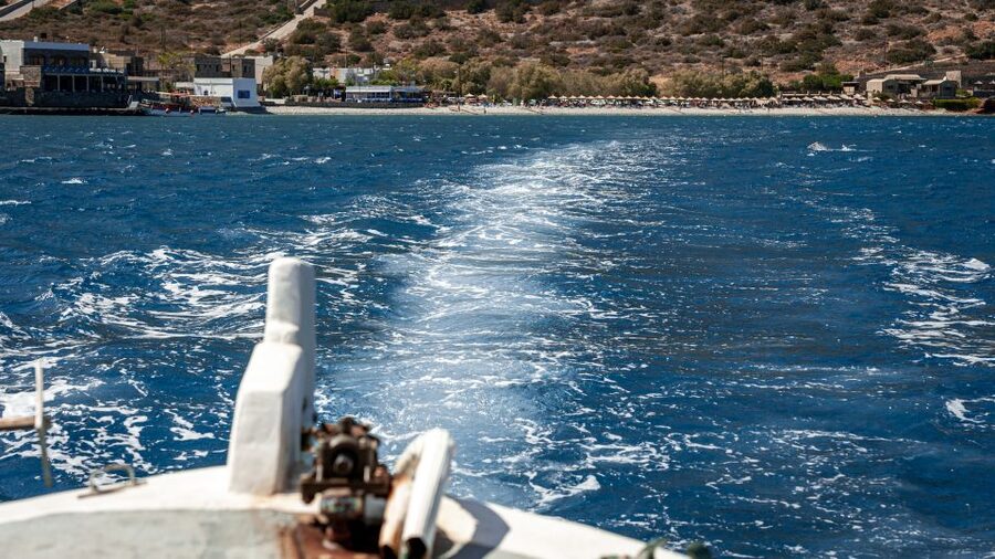 From Heraklion: Elounda, Kolokitha, and Spinalonga Boat Trip - Guide languages, comfort, and the shared-boat feel