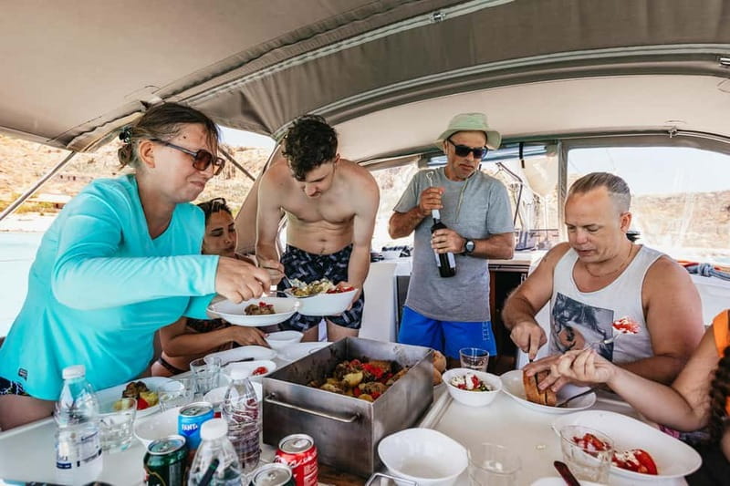 From Kissamos: Balos Gramvousa Sailing Cruise with Lunch - A traditional Cretan lunch under the shaded deck